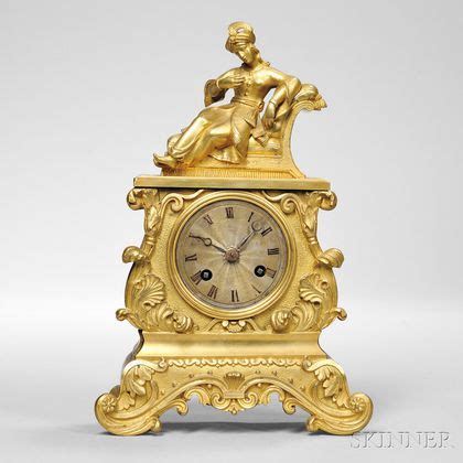 Sold At Auction Diminutive Gilt Brass Figural Mantel Clock Auction