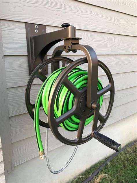 Liberty Garden Navigator Rotating Garden Hose Reel Holds Feet