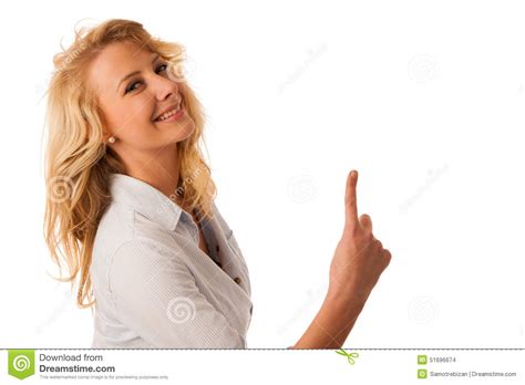 Young Woman Pointing Into Copy Space Isolated Over White Backgr Stock