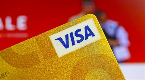 Closeup Of On Single Isolated Golden Visa Credit Card Blurred Online