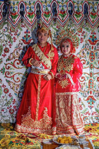 A Bride And Groom At A Traditional Sulawesi Wedding Makassar Sulawesi Indonesia Southeast