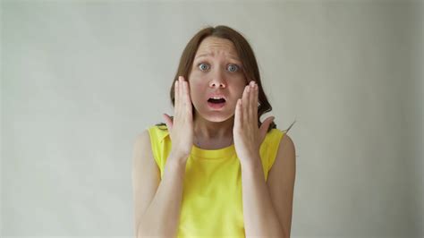 Portrait Of A Beautiful Young Woman Gesticulating With Her Hands