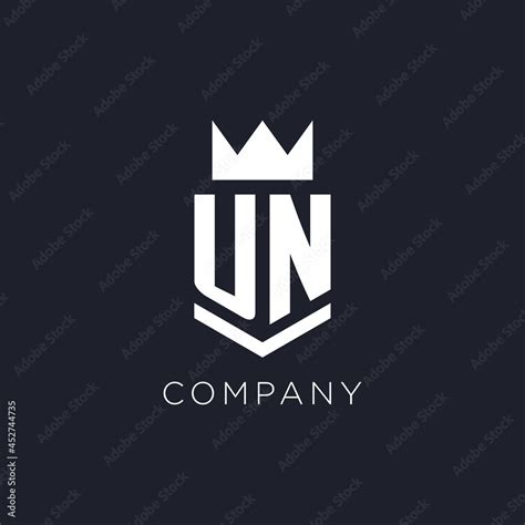 Un Logo With Shield And Crown Initial Monogram Logo Design Stock