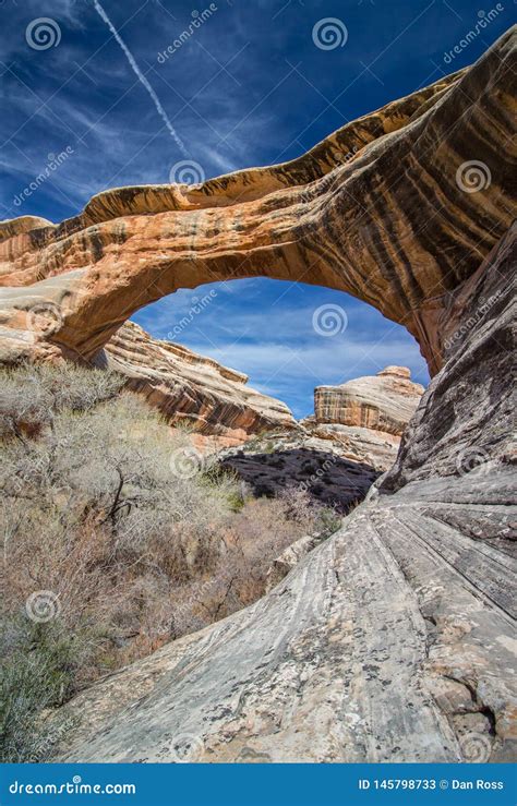 A Rock Bridge Over A Canyon At Natural Bridges National Monument Stock