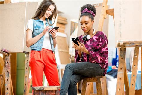 Young Creative Student With Colorful Lamps And Books Stock Image