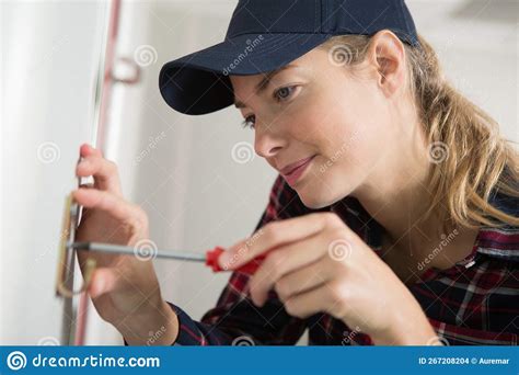 Woman Installing A Hook Stock Photo Image Of Home Hook 267208204