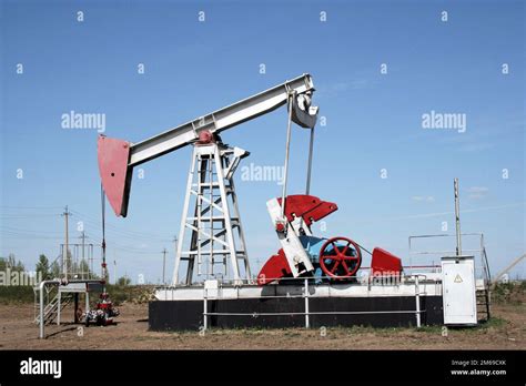 Industrial Construction And Mechanism Oil Pump Jack Stock Photo Alamy