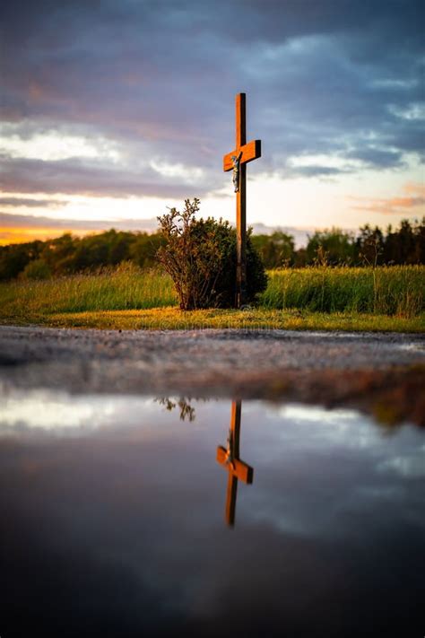 Reflection Of A Crucifix At Sunset Stock Photo Image Of Horizon