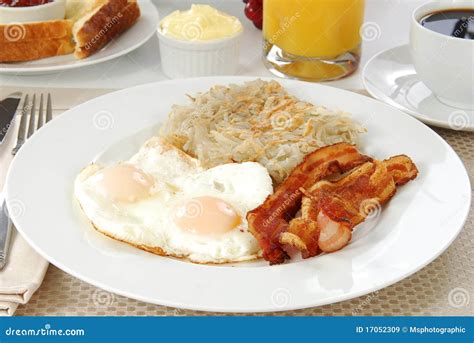 Bacon Eggs and Hash Browns stock image. Image of easy - 17052309