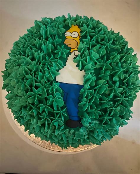 ‘Homer Simpson disappearing into a hedge’ cake | Odd Stuff Magazine