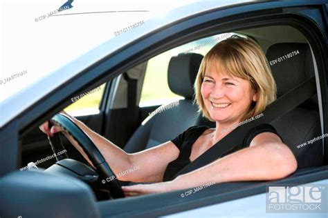 Mature Woman Driving Car Stock Photo Picture And Low Budget Royalty