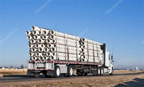 Semi-truck with a load of plastic pipe — Stock Photo © rcarner #2554150