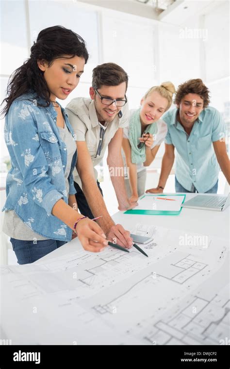 Fashion Designers Discussing Designs Stock Photo Alamy