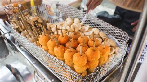 The Fried Orange Eggs That Are A Staple Filipino Street Food