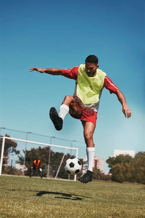 Sport Fitness And Soccer Training With Soccer Player In Soccer Ball