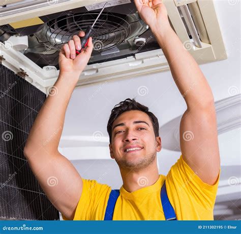 Repairman Repairing Ceiling Air Conditioning Unit Stock Image Image