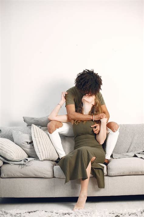 Multiracial Couple In Love On The Couch Stock Image Image Of Couple