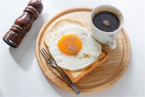 Fried egg on brown toast stock photo. Image of handmade - 2320654