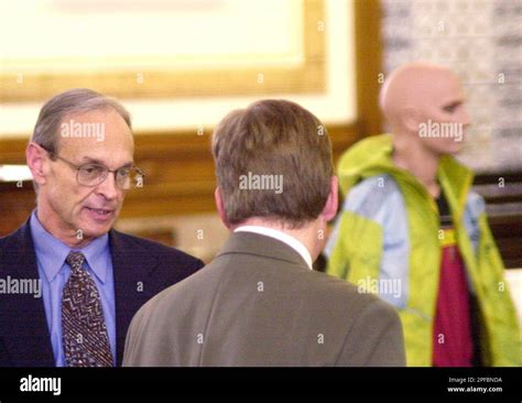 Dr Dirk Greineder Left Confers With His Attorney Martin F Murphy