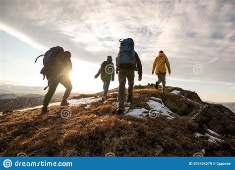 Hikers With Backpacks Walks In Mountains At Sunset Stock Image Image