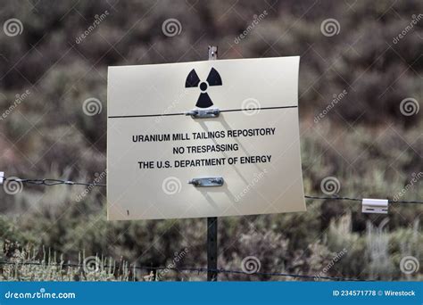 Selective Focus Shot Of Uranium Mill Tailings Repository Warning Sign