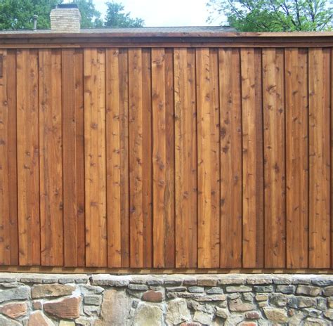 Cedar Fence With Retaining Wall Fence Companies Gate Companies