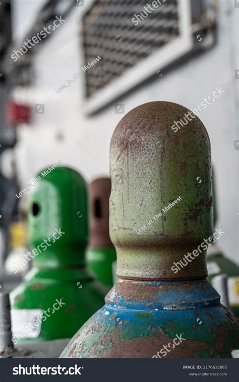 Compressed Gas Cylinders Being Stored Vertically Stock Photo 2176632865