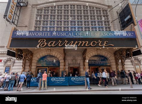 Throngs Of Theatergoers Descend On The Barrymore Theatre On Broadway In