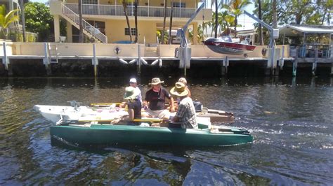 Three Boats Six Hulls One Outboard Motor Four Divers And One