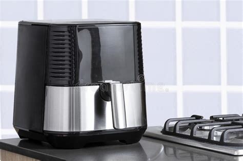Small Kitchen Appliance Hot Air Fryer Photo In The Kitchen Stock Photo Image Of Digital