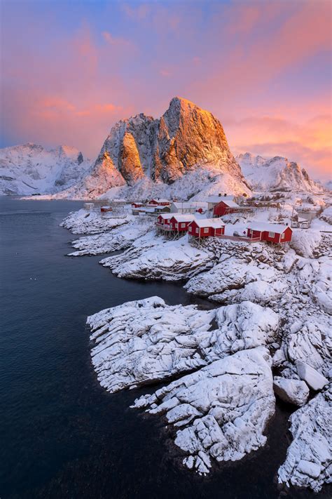 Red Cabins In Winter Snow Covered Mountains Lofoten Print | Photos by ...