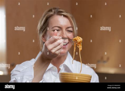 Woman Eating Spaghetti Stock Photo Alamy