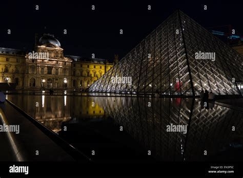 France, Paris, The Louvre at night Stock Photo - Alamy