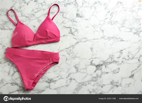 Beautiful Pink Bikini White Marble Background Top View Space Text Stock Photo By NewAfrica