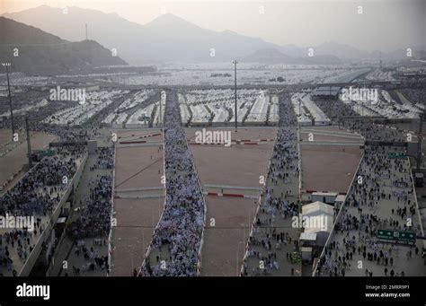 Muslim Pilgrims Walk From Their Camps In Mina To Cast Stones At Three