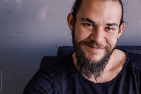 Portrait Of Happy Brunette Man With Beard And Mustache By Stocksy