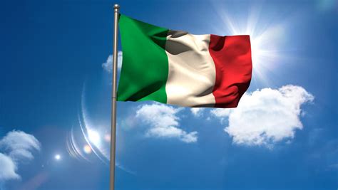 Italy National Flag Waving On Flagpole On Blue Sky Background Stock