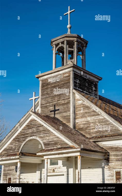 Steeple Bell Tower And Crosses Of St Joseph Catholic Church In