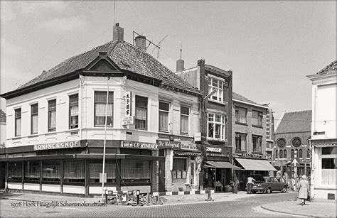 An Old Black And White Photo Of Some Buildings