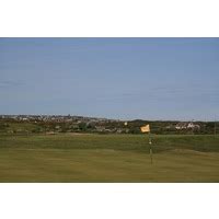 Get a taste of traditional heathland golf at Holyhead Golf Club in Wales