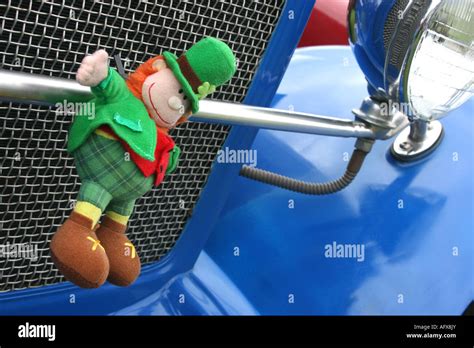 Lucky Irish Leprechaun Mascot On Badge Bar Of Car Stock Photo Alamy