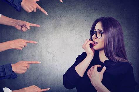 Anxious Woman Judged By Different Peopleshutterstock645776632