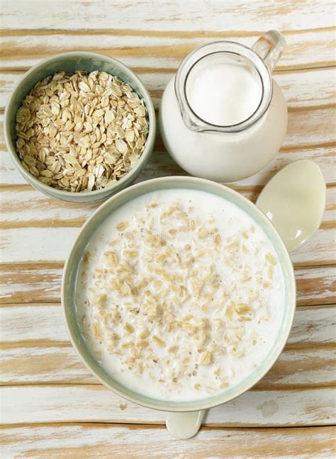 Oat Porridge With Milk And Ripe Raspberries Stock Photo Image Of