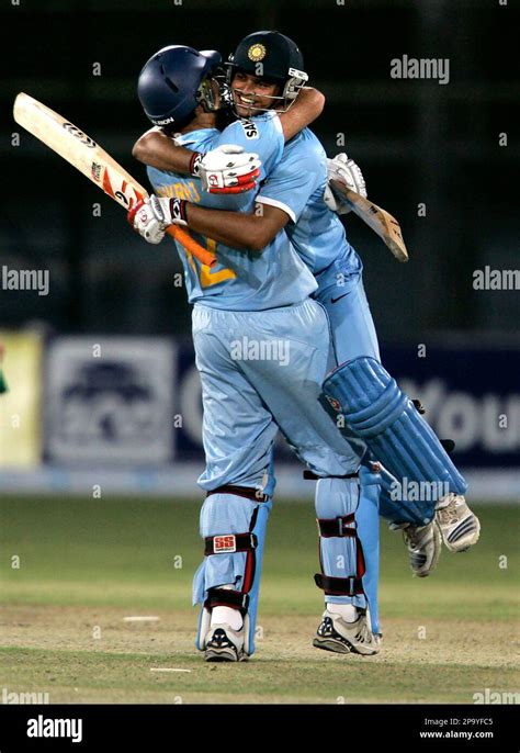 Indian Batsman Suresh Raina Face To Camera Celebrates With Teammate