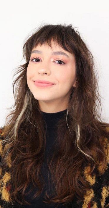 Shag Haircuts With Bangs A Trace Of Blonde