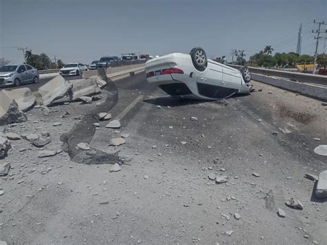 Aparatoso choque de tráiler y volcadura de auto en la México 15 en JJR