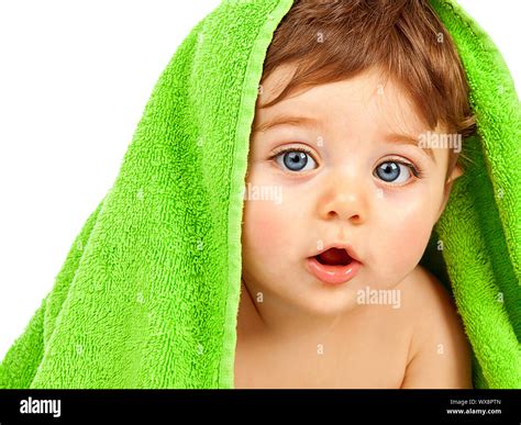 Image Of Cute Baby Boy Covered Green Towel Isolated On White Background