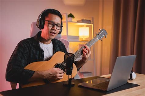 Premium Photo Asian Man Youtuber Live Streaming Performance Playing