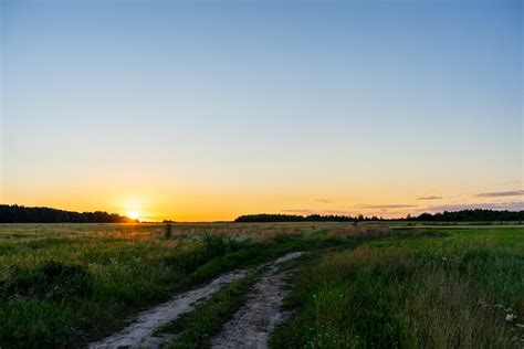 View of a Dirt Road at Sunset · Free Stock Photo