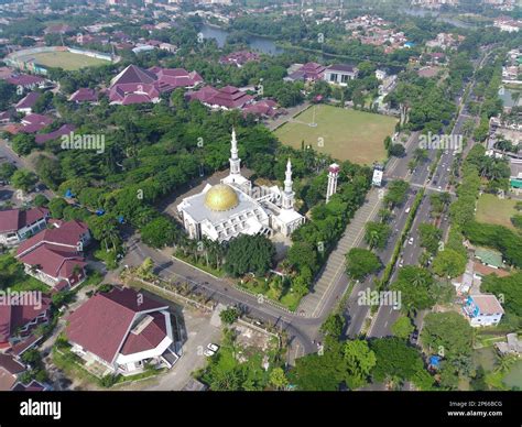 4K footage aerial view of the Baitul Faidzin Grand Mosque at noon in ...